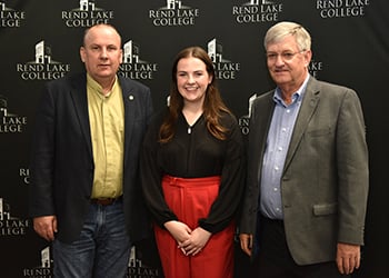 President Terry Wilkerson, new Student Trustee Maggie Stacey, and Board Chairman Randy Rubenacker